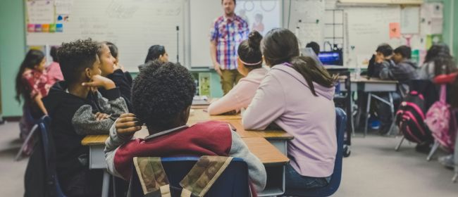 Students sitting in a classroom.