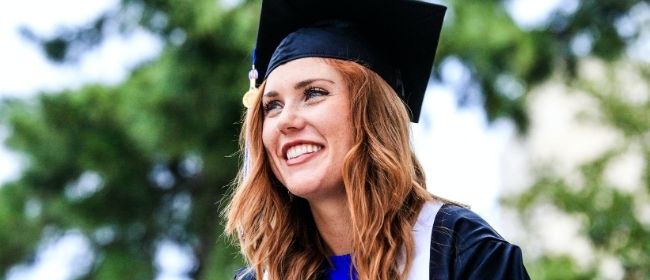 Female in Cap and Gown