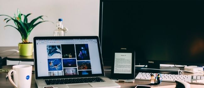 Laptop, monitor, and tablet on a desk