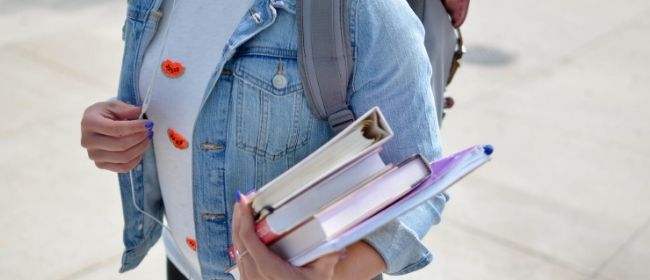 Girl carrying books