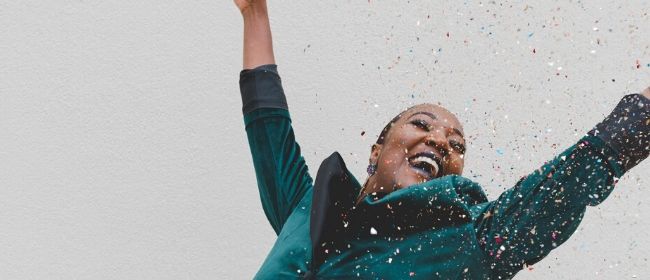 Women celebrating with confetti.